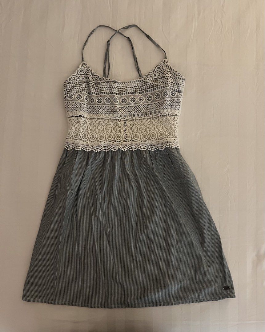 Roxy dress (Category: Dresses) located in Quezon City. Submitted by inthefrow (Listing ID 1469821394, Image 1). Description: - Preloved - Pretty blue and white striped dress - Accent: Lace detail - Easy zip at the back • Best price already .