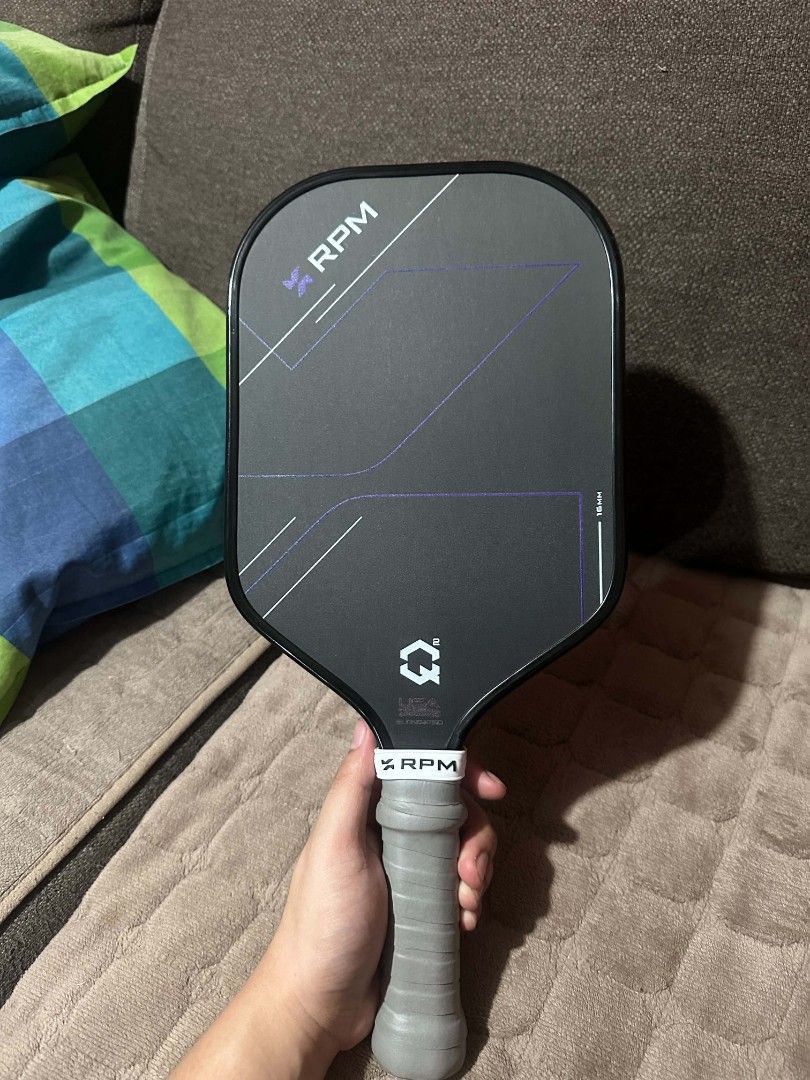 RPM Q2 Pickleball Paddle 16mm (Category: Other Sports Equipment and Supplies) located in Quezon City. Submitted by geraldines71432 (Listing ID 1469942332, Image 2). Description: Original RPM Q2 - Elongated 16 mm -Bought from Sampaguita Pickleball store (14,500) w/ receipt -Has balls marks on paddle surface due to normal use -Grit still 10/10 -Good condition and well maintained -Stock grip still installed & Edge guard since day one Selling price: 