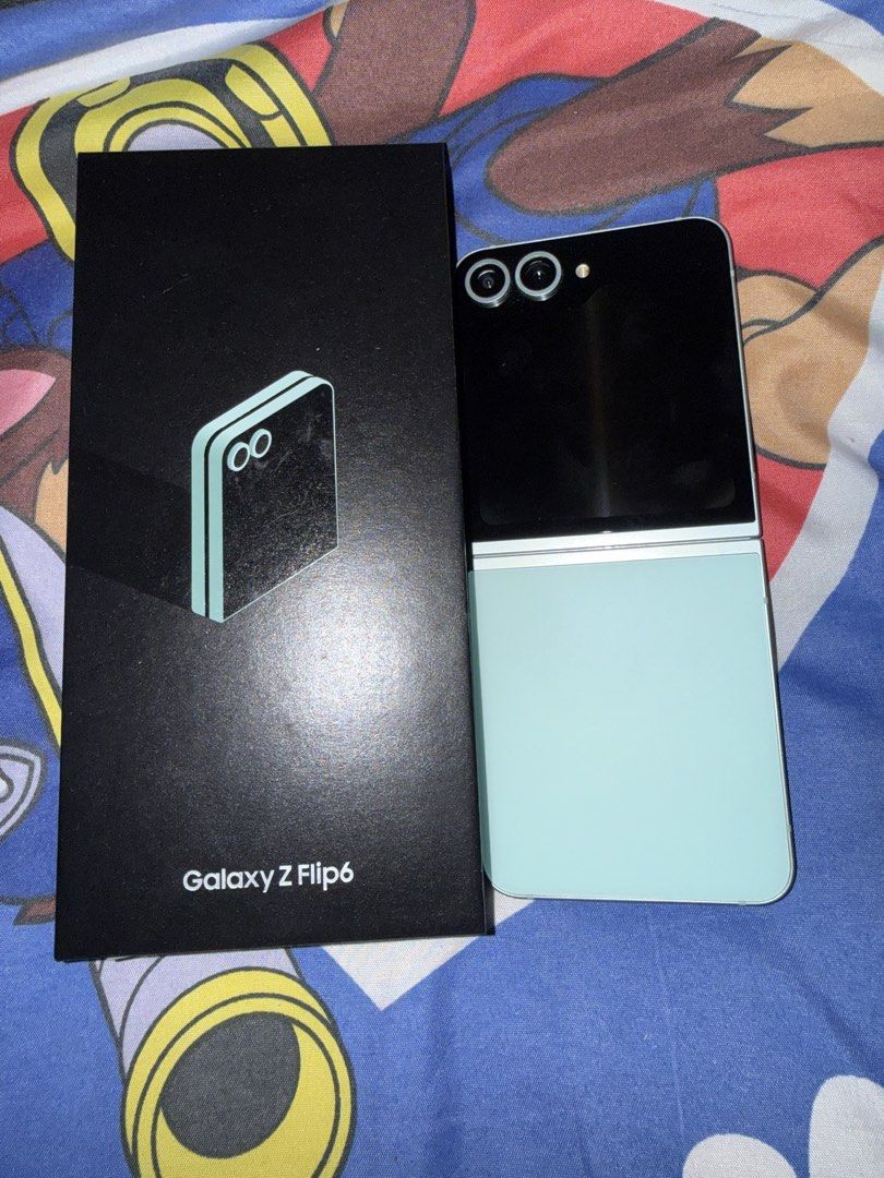 RUSH! Samsung Z Flip 6 (Category: Samsung) located in Angeles City. Submitted by snorlaxlovesspongebob (Listing ID 1469868028, Image 1). Description: 12/256gb Mint green No performance issues Smooth no dents HK Variant dual physical sim (not clone) no NTC but this is ORIG samsung with same specs sa NTC released only the difference is the sim applicability mag research po wag obob! Openline both sim Personal backup phone RFS stick to iphone Nego f