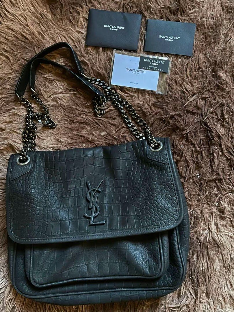 Saint Laurent Crocodile Embossed Shoulder Bag (Category: Luxury Bags & Wallets) located in Lingayen. Submitted by jayteeeezy (Listing ID 1469818298, Image 1). Description: - Brand: Saint Laurent (YSL) - Style: Chain shoulder bag - Material: Black crocodile embossed leather - Hardware: Ruthenium-tone - Features: Iconic YSL monogram, dual chain straps with leather comfort pads, exterior back slip pocket - Interior: Zipped pocket with YSL branding -