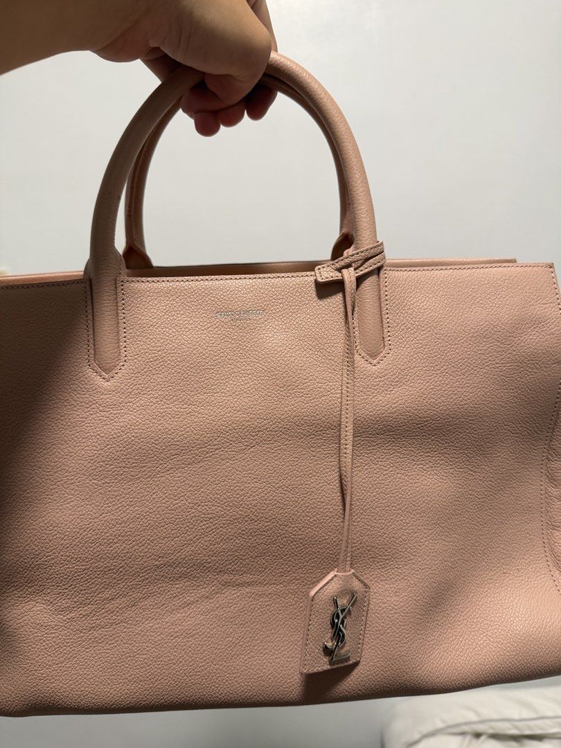 Saint Laurent (YSL) Leather Rive Gauche Medium in Pink (Category: Luxury Bags & Wallets) located in Iloilo. Submitted by lorenzoivan (Listing ID 1469759981, Image 2). Description: PRELOVED: Saint Laurent (YSL) Leather Rive Gauche Medium in Pink - ₱30,000 SRP: $2,450 / ₱155,500 LEGIT/AUTHENTIC: w/ dustbag, card, strap in good condition Flaws: Weak structure dirty inside light signs of usage Asking for ₱35,000 (NEGOTIABLE) Pre-owned prices range fr