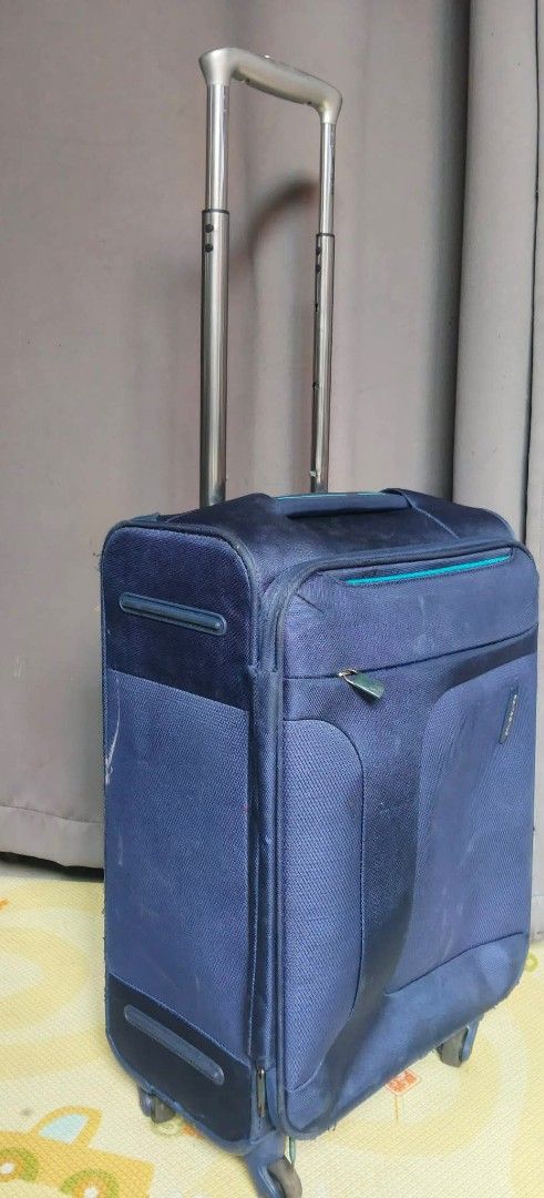 Samsonite Asphere Handcarry Cabin Size Luggage (Category: Luggage) located in Valenzuela. Submitted by gracebacot17959 (Listing ID 1469783134, Image 3). Description: - Authentic Samsonite Asphere cabin size luggage, directly imported from Japan - Color: Dark blue fabric with stylish turquoise accents - Dimensions: 21 x 14 x 9 inches (Cabin / Handcarry size) - Lightweight design: Weighs only 2.29kg - Mobility: Four smooth-rolling wheels and a bran