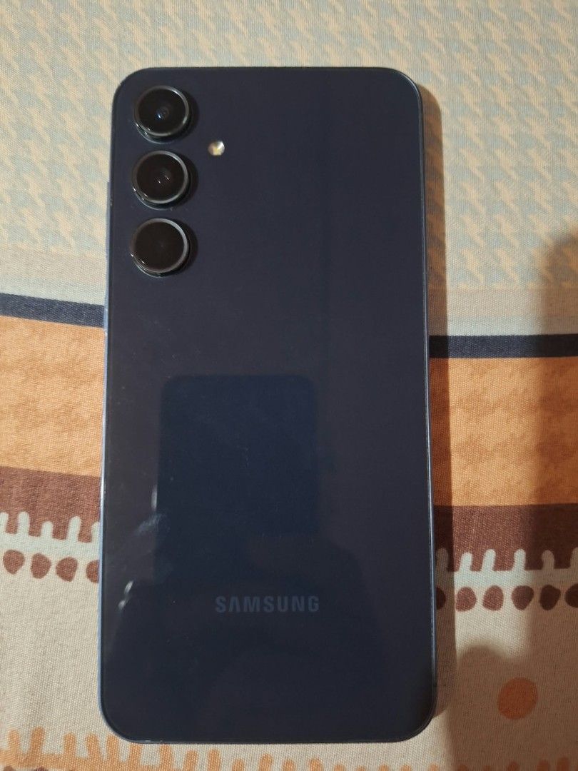 SAMSUNG GALAXY A55 5G (Category: Samsung) located in Pasig City. Submitted by jjjshoppe (Listing ID 1469769920, Image 3). Description: Samsung Galaxy A55 5G RAM: 8GB Storage: 128GB SIM1: Smart lock SIM2: Open line Condition: in good working condition, all working, no repair history and like new Others: Complete with box and unuse original cable.