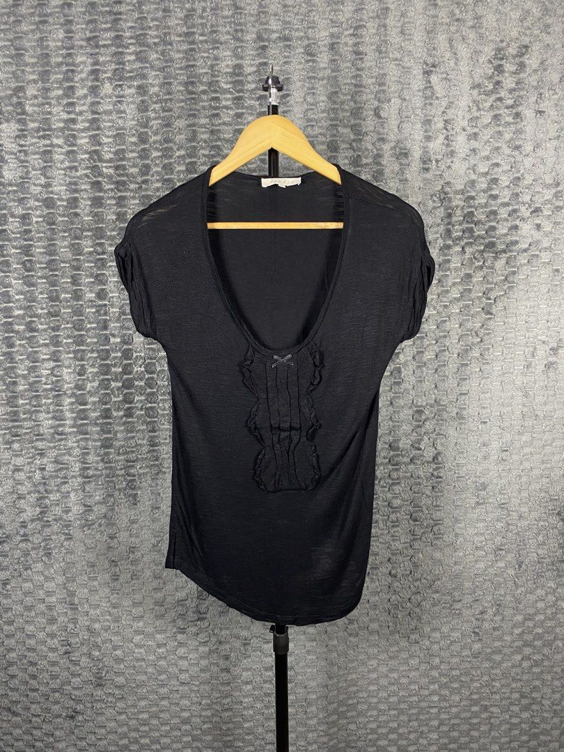 Sandro Black Ruffled Shirt (Category: Blouses) located in Bacolod City. Submitted by treasurehunts.6100 (Listing ID 1469911468, Image 1). Description: Sandro Black Ruffled Shirt Condition - Excellent Color - Black Color rate - 9.8 / 10 No Flaws Size 1 Dimensions : Width - 16.5 Length - 25 Brands you might find on my profile : ( Cos, Uniqlo, H&M, Zara, Muji, Ralph Lauren, Hugo Boss, Fred Perry, Lacoste, Armani, Oakley, The North Face, Lululemon, A