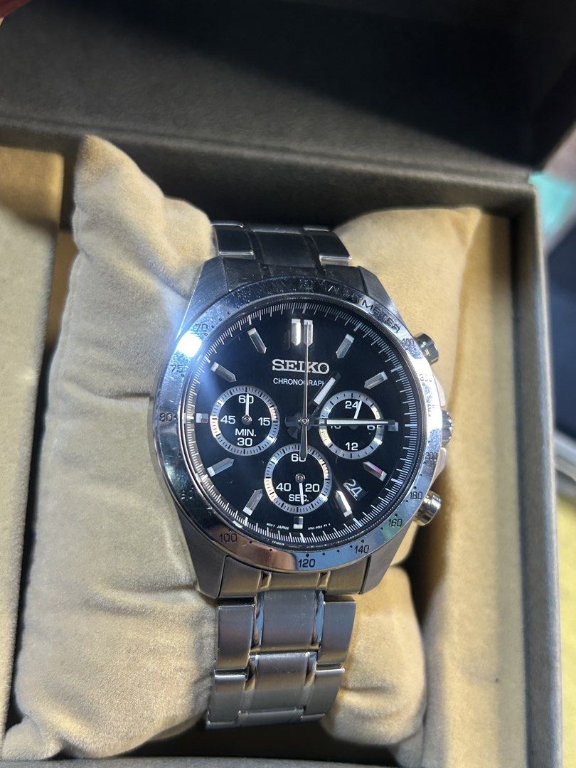 Seiko Chronograph Tachymeter Quartz Watch with Box (Category: Men's Watches) located in Cavite. Submitted by mamamia73 (Listing ID 1469931680, Image 2). Description: - Brand: Seiko - Movement: Quartz Chronograph - Dial: Black with 3 sub-dials and tachymeter bezel - Material: Stainless steel case and bracelet - Condition Note: Bracelet clasp features Casio replacement branding - Details: Case back stamped 8T63-00P0, Serial #894497 - Inclusion: Ori