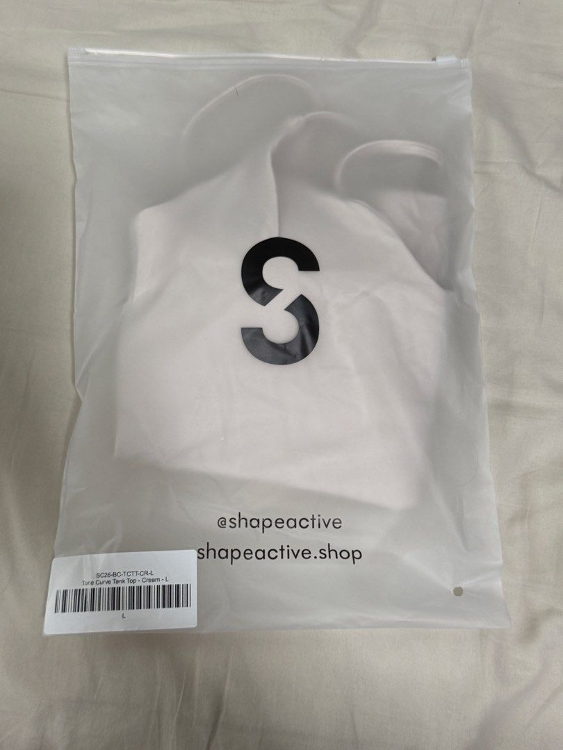 Shape Active tone curve tank top - Cream (Large) (Category: Activewear) located in Makati City. Submitted by swimarchives (Listing ID 1469782565, Image 3). Description: Brand new recently bought Prefer the stride tank tops .