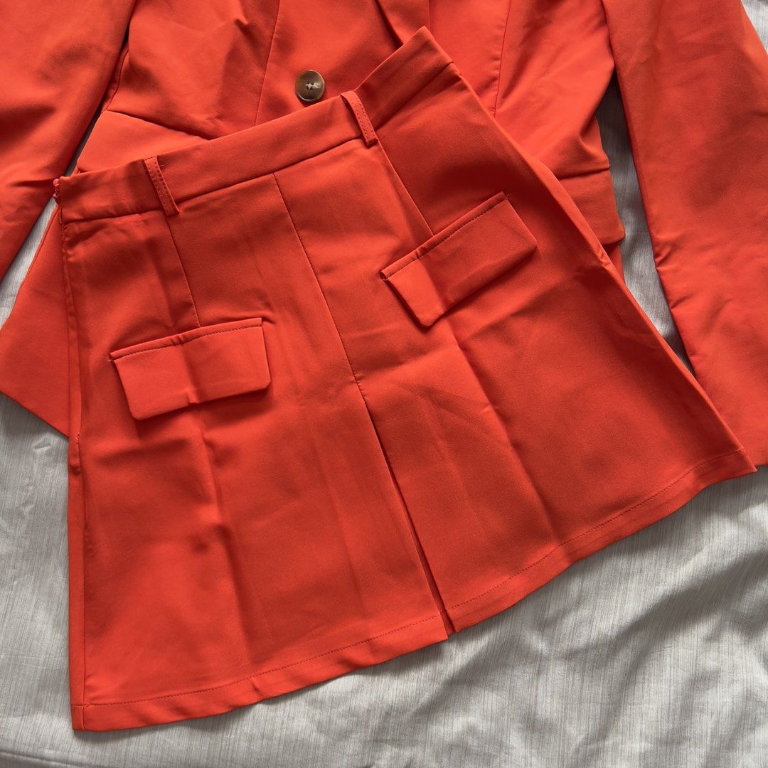 Evolushein Bright Orange Mini Skirt (Category: Skirts) located in Pasig City. Submitted by jenscloset86 (Listing ID 1469823806, Image 2). Description: Brand: SHEIN (evolushein) Size: SMALL Color: Bright Orange/ Red Orange • BRAND NEW (but washed once). • Never used, never worn. • No flaws, no damages. Measurement: Length: 17” Waist: 27” Hip: 39” .