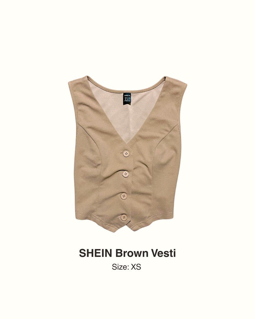 SHEIN Brown Vesti Size XS (Category: Sleeveless) located in Manila. Submitted by maaya.rikit (Listing ID 1469936298, Image 1). Description: - Brand: SHEIN - Size: XS - Color: Brown (Neutral Earthy Tone) - Design: V-neckline with 4 front buttons - Fit: Tailored shape with a cropped hem - Styling: Great for layering or pairing with pants and skirts.