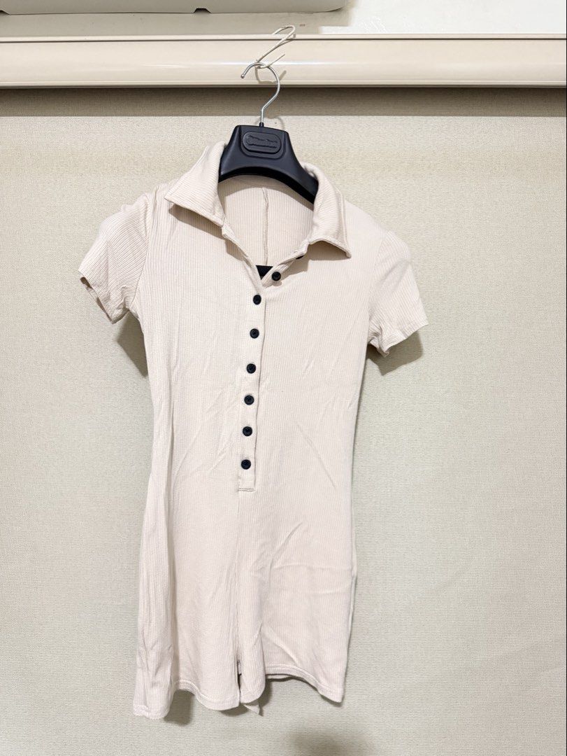 Shein Ribbed Collared Button-Front Romper Size S (Category: Rompers) located in Cavite. Submitted by mgd.blessed (Listing ID 1469909849, Image 1). Description: - Brand: Shein - Item: Ribbed Romper with Attached Shorts - Color: Beige - Size: S (EU 36, US 4) - Details: Short sleeves, polo collar, full front button placket, stretchy textured fabric - Condition: Clean, minimal wear - Perfect for effortless casual everyday outfits.