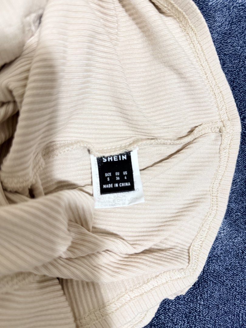 Shein Ribbed Collared Button-Front Romper Size S (Category: Rompers) located in Cavite. Submitted by mgd.blessed (Listing ID 1469909849, Image 2). Description: - Brand: Shein - Item: Ribbed Romper with Attached Shorts - Color: Beige - Size: S (EU 36, US 4) - Details: Short sleeves, polo collar, full front button placket, stretchy textured fabric - Condition: Clean, minimal wear - Perfect for effortless casual everyday outfits.