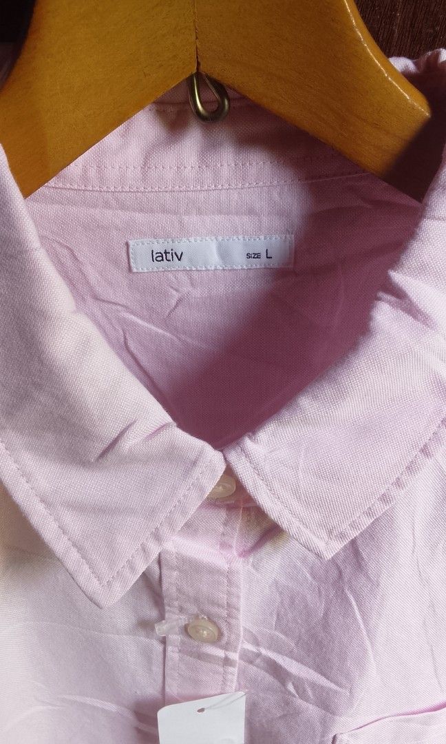 SHORT SLEEVE LATIV (Category: Others Tops) located in Manila. Submitted by plong7 (Listing ID 1469785435, Image 2). Description: DETAILS DIMES 19.5 x 26 COLOR RATE 10/10 NO ISSUE Brand: Lativ Style: Short-sleeve button-down shirt Color: Soft light pink Fabric: 100% Cotton — lightweight, breathable, and comfortable Features: Classic collar, left chest pocket, full button placket Condition: Brand new with tag attached LOCATION: DAVAO DE ORO.