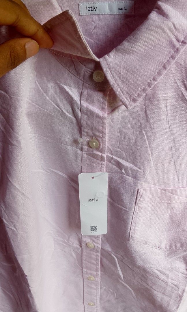 SHORT SLEEVE LATIV (Category: Others Tops) located in Manila. Submitted by plong7 (Listing ID 1469785435, Image 3). Description: DETAILS DIMES 19.5 x 26 COLOR RATE 10/10 NO ISSUE Brand: Lativ Style: Short-sleeve button-down shirt Color: Soft light pink Fabric: 100% Cotton — lightweight, breathable, and comfortable Features: Classic collar, left chest pocket, full button placket Condition: Brand new with tag attached LOCATION: DAVAO DE ORO.