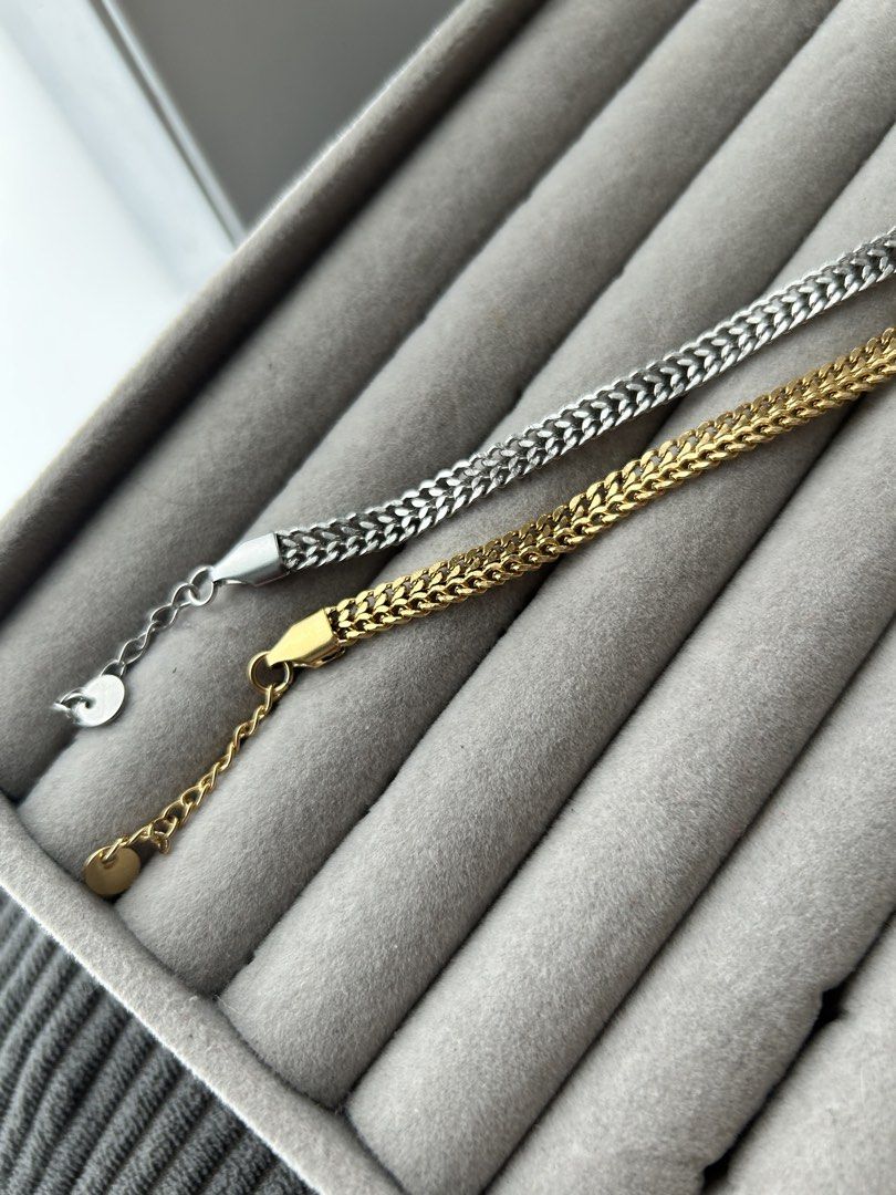 Silver and Gold Chain Bracelets (Category: Bracelets) located in Manila. Submitted by elonlineshop (Listing ID 1469790895, Image 3). Description: - silver-tone and one gold-tone bracelet - Design: Intricate braided link style - Adjustable: Comes with secure lobster clasps and extension chains - Versatile: Wear them stacked together or separately - Everyday wear: Perfect accessories for daily casual or chic looks - Stainless Steel -Unisex.