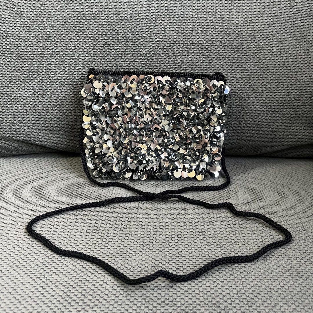 Silver Sequin Party Evening Crossbody Bag (Category: Cross-body Bags) located in Silang. Submitted by f4iry4rch1ve (Listing ID 1469859812, Image 2). Description: Silver Sequin Party Evening Crossbody Bag 400 php+ sf Dimensions: view the pictures above -from Japan -adjustable strap - actual photos Note: Colors may vary due to lighting Please message me for shipping and payment method....