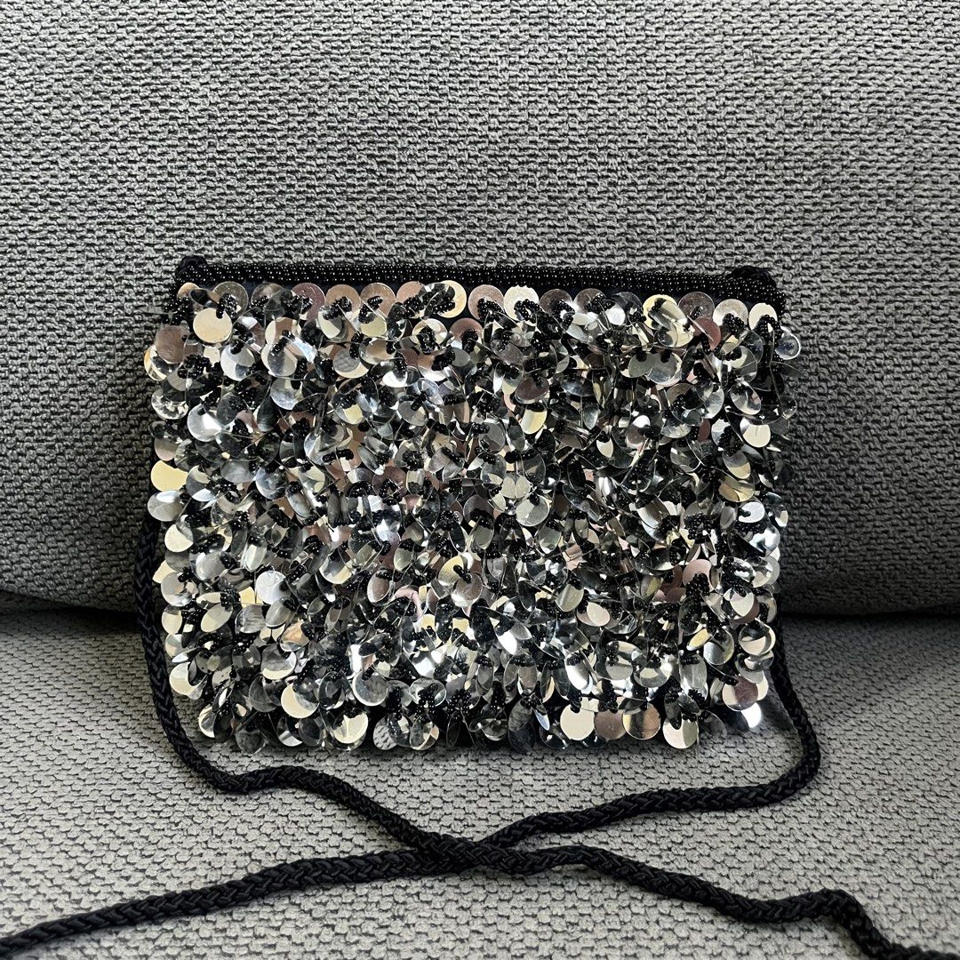 Silver Sequin Party Evening Crossbody Bag (Category: Cross-body Bags) located in Silang. Submitted by f4iry4rch1ve (Listing ID 1469859812, Image 1). Description: Silver Sequin Party Evening Crossbody Bag 400 php+ sf Dimensions: view the pictures above -from Japan -adjustable strap - actual photos Note: Colors may vary due to lighting Please message me for shipping and payment method....