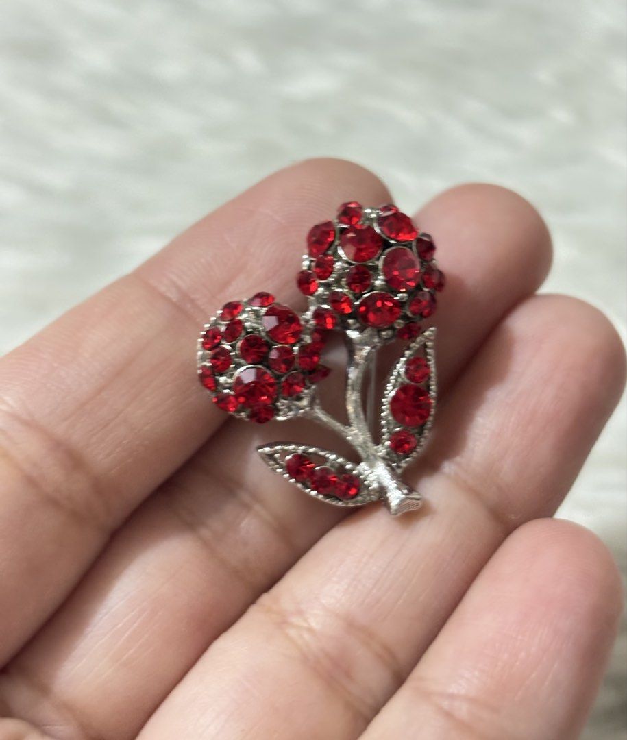 Silver-tone cherry brooch (Category: Brooches) located in Paranaque City. Submitted by dalle_closet (Listing ID 1469791191, Image 2). Description: slightly used.
