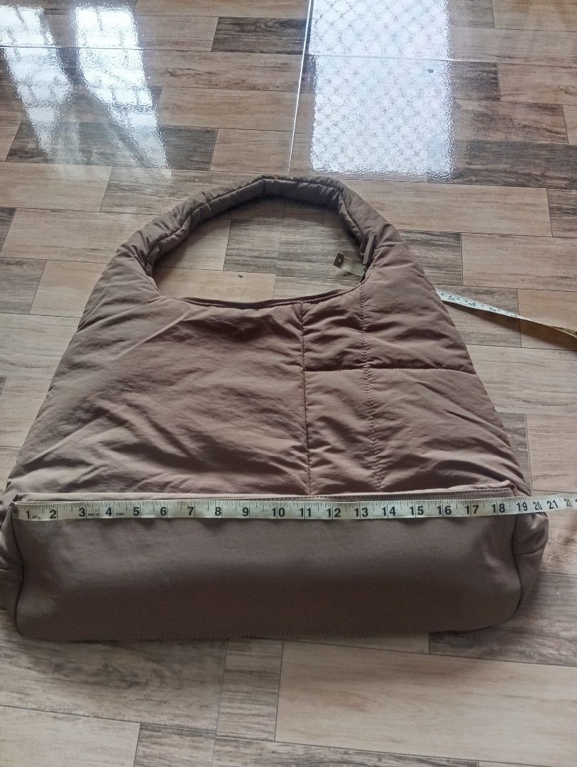 Slouch Gym Bag (Category: Shoulder Bags) located in Binangonan. Submitted by lalamo_collection (Listing ID 1469782189, Image 3). Description: Features Nylon Recycled polyester lining Internal divider for laptop Ideal gym and carry-on bag Shoulder bag Large size: 49cm x 32cm x 13cm.