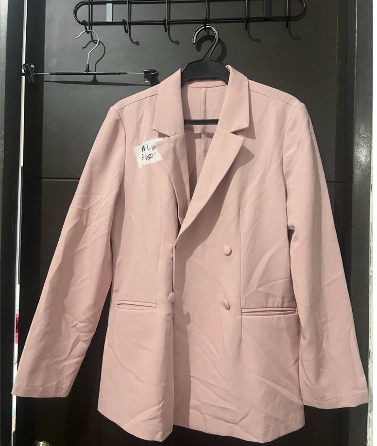 SM Brand Pink Blazer M-L (Category: Coats, Jackets and Outerwear) located in Manila. Submitted by viadinamama143 (Listing ID 1469813233, Image 1). Description: - Brand: SM - Color: Pastel Pink - Size: Fits M to L - Style: Double-breasted with classic lapel collar - Features: Two functional side pockets - Condition: Brand new with tag still attached (handwritten price notes on tag) - Clean and ready to wear.