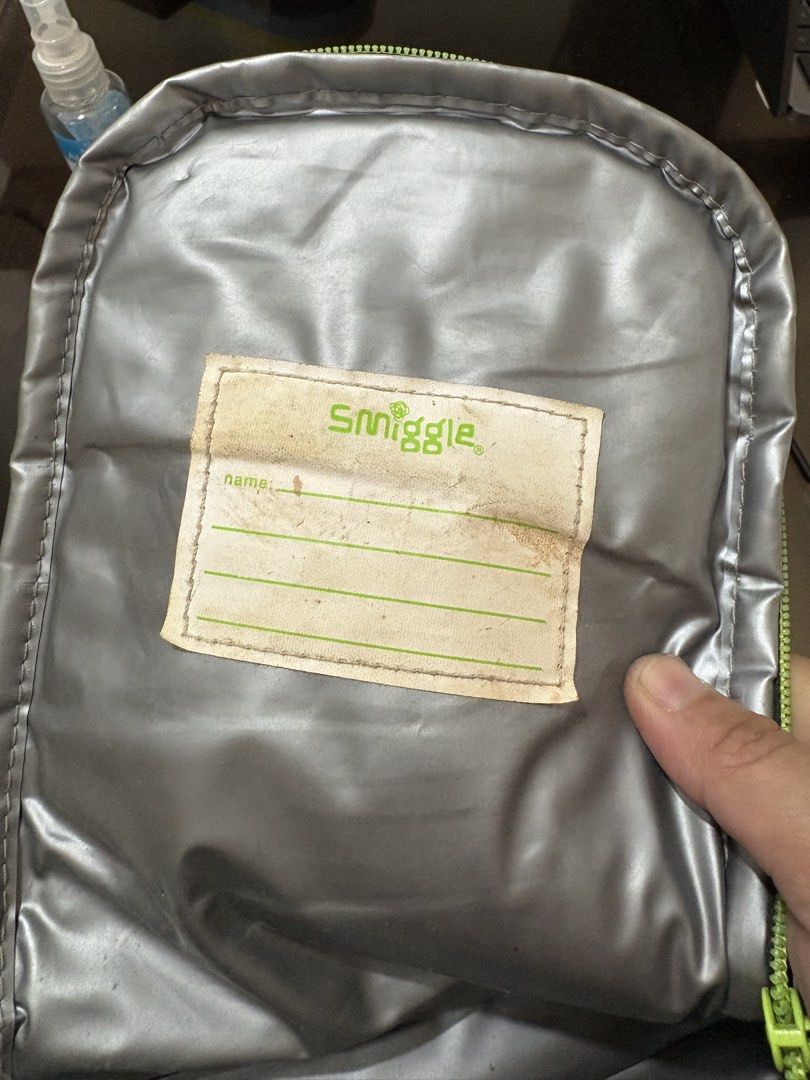 Smiggle Minecraft Lunch Bag (Category: Tote Bags) located in Bacoor. Submitted by grandfire.02c841 (Listing ID 1469881674, Image 3). Description: - Official Smiggle x Minecraft collaboration lunch bag - Striking black and green colorway with iconic Creeper pixel graphics - Dual zippered compartments to keep food secure - Adjustable strap for comfortable carrying - Ideal for school use, gaming fans, or day trips Needs cleaning, with the price, pls
