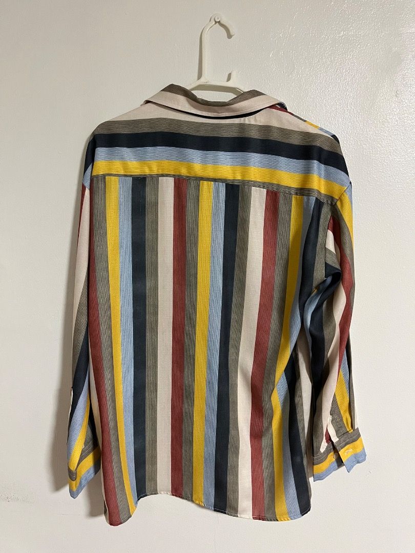 Smyth Multicolor Striped Button Down Shirt (Category: Tshirts & Polo Shirts ) located in Cabuyao City. Submitted by rdtrmt (Listing ID 1469869928, Image 2). Description: - Brand/Style: Smyth button-down shirt - Pattern: Vibrant multi-color vertical stripes (yellow, blue, red, grey, black) - Size: S - Material: Lightweight fabric - Features: Collared neck, long sleeves, front button closure.