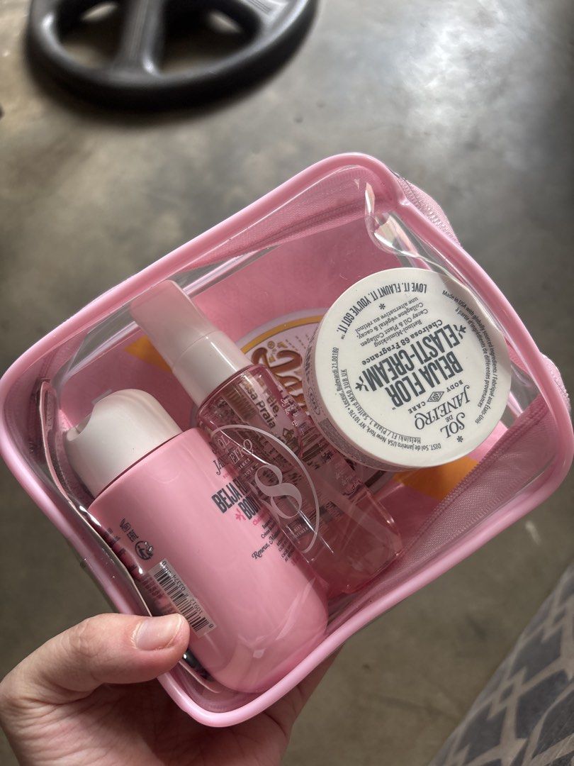Sol de Janeiro Beija Flor Jet Set (Category: Face Care) located in Makati City. Submitted by anya.miaw (Listing ID 1469796675, Image 1). Description: FROM 🇬🇧🇬🇧🇬🇧 - Brand new, unopened Sol de Janeiro Beija Flor set in original packaging - Comes in a cute, reusable pink transparent zip pouch - Includes Cheirosa 68 perfume mist spray, body cream, and Elasti-Cream jar - Perfect travel-friendly sizes for your bag, gym kit, or luggage - Great gif