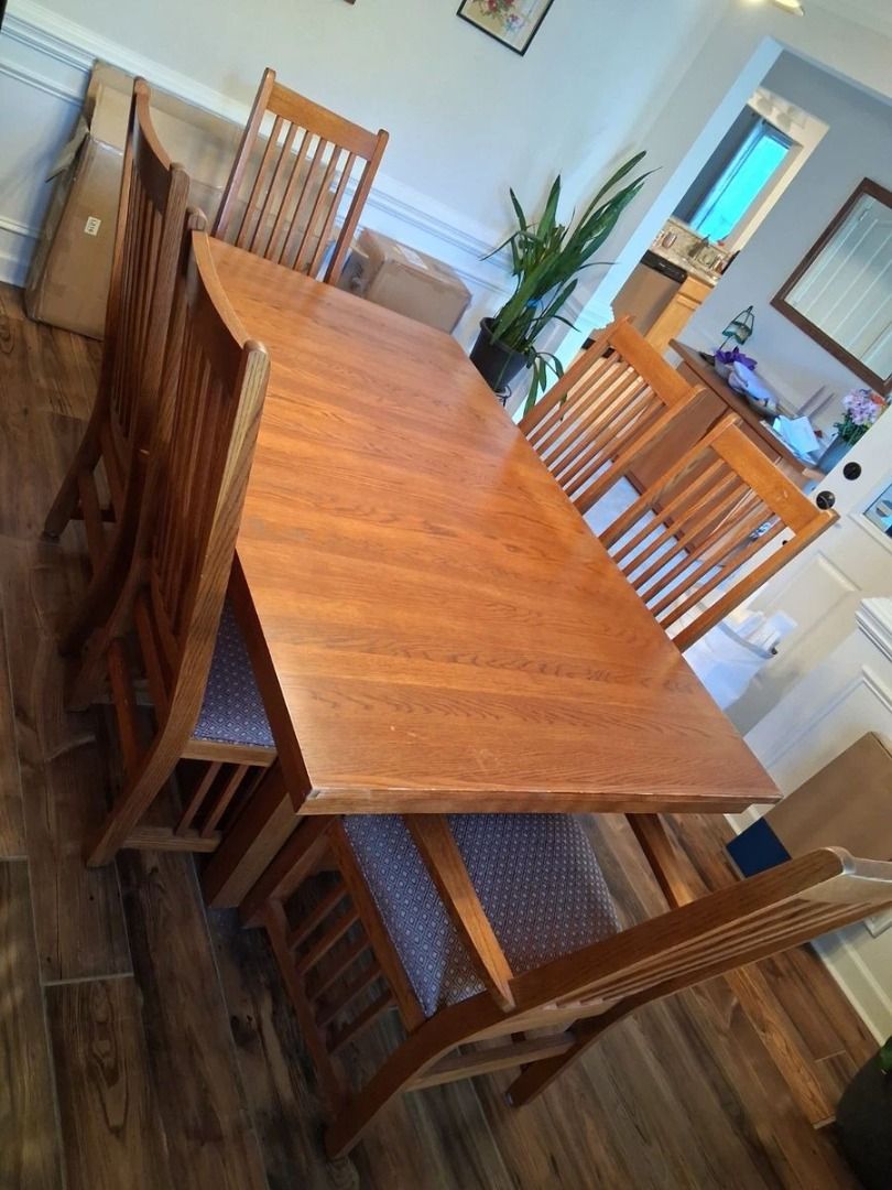 Solid Oak Mission Dining Set - Expandable Table with 6 Chairs (Category: Tables & Sets) located in Manila. Submitted by vashtardo (Listing ID 1469843951, Image 1). Description: - Material: Solid oak with warm honey wood finish - Seating: Comfortably seats six with matching slat-back chairs - Style: Mission-style legs and stretcher base, very sturdy construction - Inclusions: Comes with a protective top pad cover - Best For: Family dinners and hos