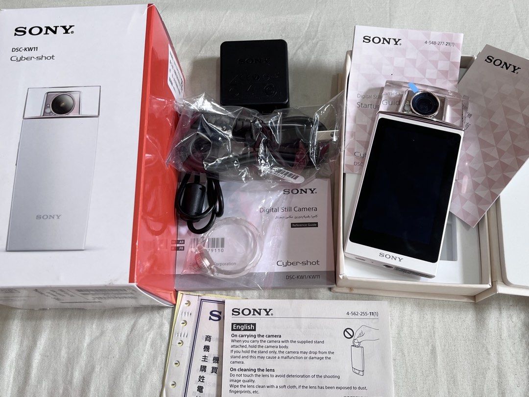 Sony Cyber-shot DSC-KW1 Digital Camera White (Category: Cameras) located in Manila. Submitted by lael_08 (Listing ID 1469795189, Image 1). Description: 💗 FOR SALE: Sony Cyber-shot DSC-KW11 Pink 💗 A rare pink perfume-bottle-shaped selfie beauty cam looking for a new owner! 🎀📸 ✨Elegant pink and rose-gold finish ✨ Open box, tested, but never actually used ✨ Complete with original box, manuals, and accessories ✨ Well-preserved condition ✨ Perfect