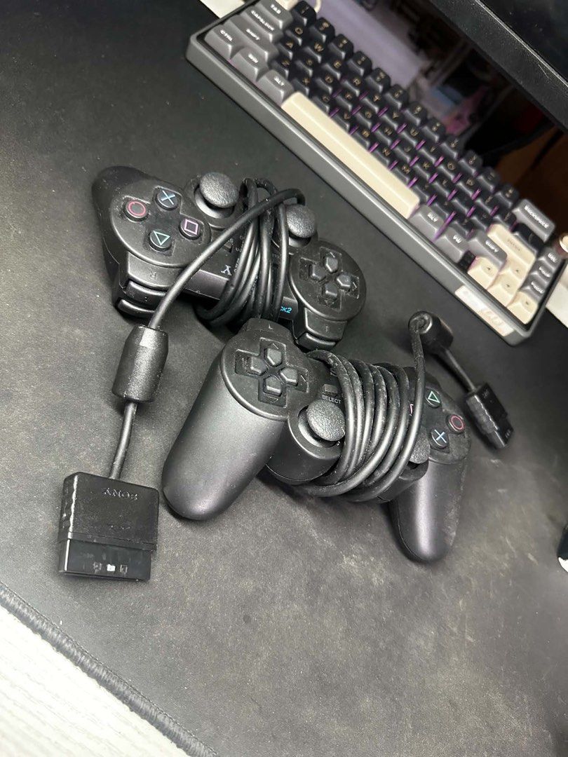 Sony PlayStation 2 Slim Console with 2 Controllers and Games (Category: PlayStation) located in Manila. Submitted by CornerStore (Listing ID 1469838494, Image 3). Description: Condition: Used, Jail Break, 2nd Hand - Accessories: 2x Controllers, 8MB memory card, Power supply, AV TV wire, External Hard Drive w/ Games .