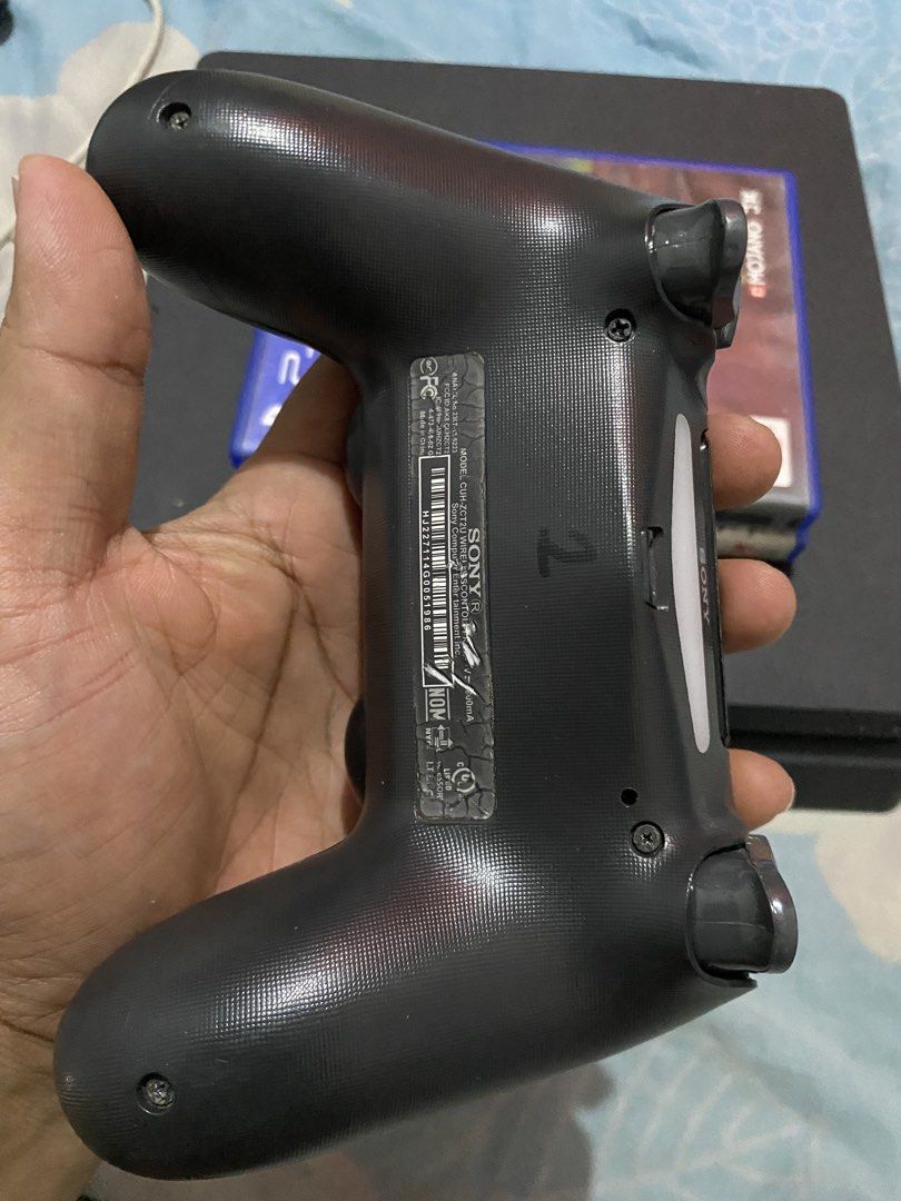 Sony PlayStation 4 Slim Console with Controller and Games (Category: PlayStation) located in Manila. Submitted by devilsdontcry (Listing ID 1469774418, Image 2). Description: - Console: Sony PlayStation 4 Slim (Black) - Controller: 1x Original DualShock 4 Wireless Controller - Games included: Minecraft PS4 Edition & NBA 2K19 (Physical Discs) - Condition: Adult-owned, clean physical appearance, powers up normally - Inclusions: Console, controller,
