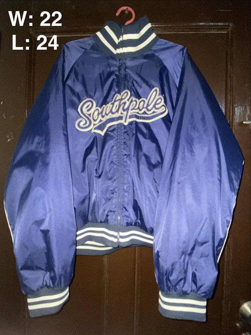 Southpole Navy Blue Varsity Bomber Jacket Size L (Category: Coats, Jackets and Outerwear) located in Manila. Submitted by almazankyle19 (Listing ID 1469879767, Image 1). Description: - Brand: Southpole - Color: Navy Blue - Style: Classic varsity bomber jacket with full zip closure - Details: Embroidered logo across the chest, striped ribbed collar, cuffs, and hem, warm quilted inner lining - Size on tag: L (16-18) - Measurements: Width 22 inches,