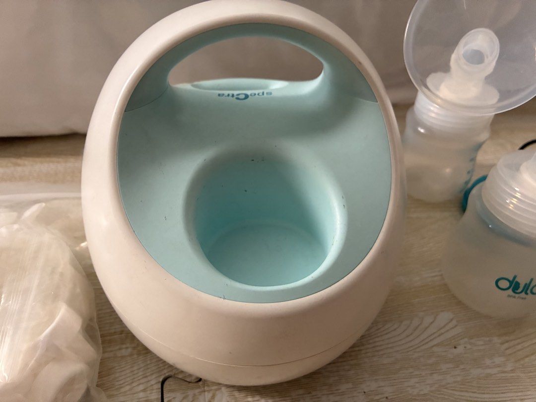 Spectra S1 Plus Double Electric Breast Pump with Accessories (Category: Breastfeeding & Bottle Feeding) located in Cagayan de Oro. Submitted by xxadl (Listing ID 1469795042, Image 3). Description: - Spectra S1 Plus double electric breast pump (hospital-grade) - Includes motor unit, power adapter/ charger, 2 tubing (with 2 extra tubes), 2 valves (with 3 extra), backflow protectors (with 1 extra), and 2 Dula bottles - Built-in rechargeable battery 