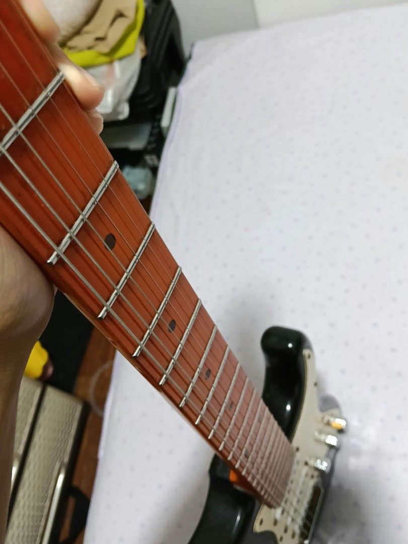 Stagg Stratocaster (Upgraded Greco Japanese Pickups) (Category: Musical Instruments) located in Quezon City. Submitted by martineenguyen (Listing ID 1469946740, Image 3). Description: Guitar has greco japanese pickups, Locking tuners, and smooth maple neck. has that fender "quack" sound on position 2 and 4 can send videos honest issues: no high e rusty bridge and string tree as seen in photo. only used in 1 gig but mostly home practice. QC area, 