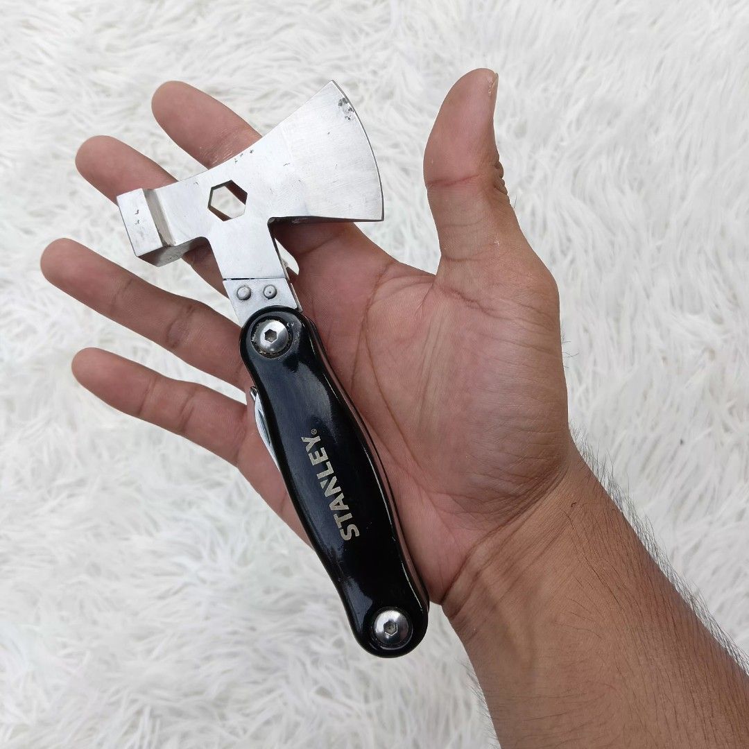 Stanley Mini Multi-Tool Axe Hammer Pocket Knife (Category: Construction Tools & Equipment) located in Gattaran. Submitted by thrift_wiseph (Listing ID 1469857224, Image 1). Description: - Brand: Stanley - 3-in-1 core tools: Axe, hammer, and pocket knife - Built-in fold-out tools: Saw blade, metal file, flathead screwdriver, and knife blade - Durable and sturdy black handle - Pocket-sized, compact, and easy to carry - Ideal for camping, outdoor ta