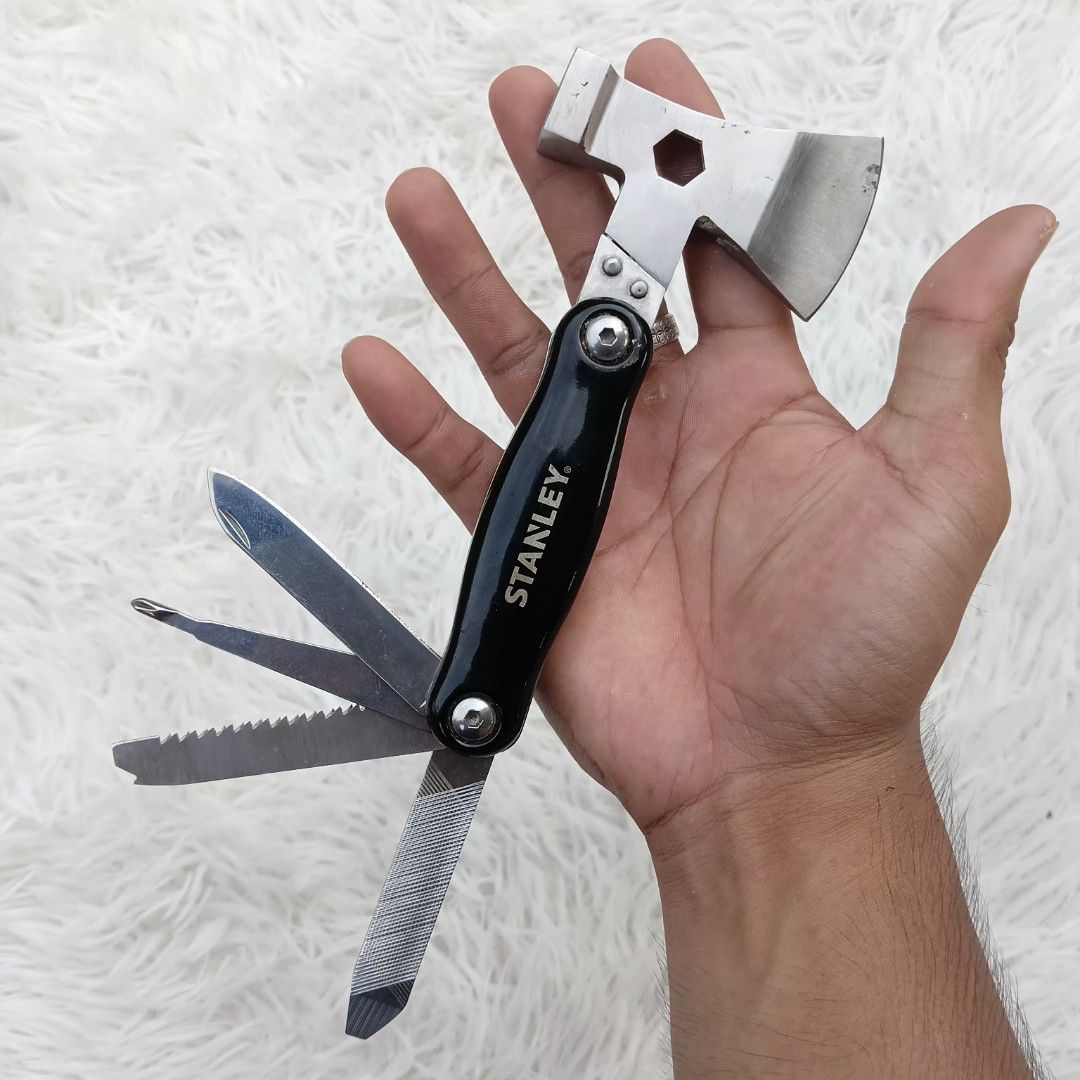 Stanley Mini Multi-Tool Axe Hammer Pocket Knife (Category: Construction Tools & Equipment) located in Gattaran. Submitted by thrift_wiseph (Listing ID 1469857224, Image 2). Description: - Brand: Stanley - 3-in-1 core tools: Axe, hammer, and pocket knife - Built-in fold-out tools: Saw blade, metal file, flathead screwdriver, and knife blade - Durable and sturdy black handle - Pocket-sized, compact, and easy to carry - Ideal for camping, outdoor ta
