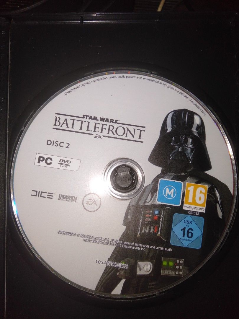 Star Wars Battlefront PC DVD-ROM Game (Category: PlayStation) located in Cavite. Submitted by emilgarcia09 (Listing ID 1469910855, Image 3). Description: Star Wars Battlefront for PC. Includes three discs featuring Stormtrooper, Darth Vader, and Luke Skywalker art. Original case and season pass insert included. Case shows minor shelf wear. Discs are clean and scratch-free. Standard PC DVD-ROM installation required..