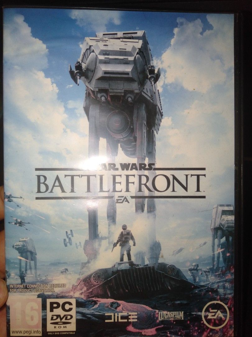 Star Wars Battlefront PC DVD-ROM Game (Category: PlayStation) located in Cavite. Submitted by emilgarcia09 (Listing ID 1469910855, Image 1). Description: Star Wars Battlefront for PC. Includes three discs featuring Stormtrooper, Darth Vader, and Luke Skywalker art. Original case and season pass insert included. Case shows minor shelf wear. Discs are clean and scratch-free. Standard PC DVD-ROM installation required..