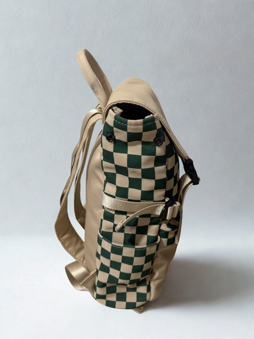 Starbucks Christy Ng Green Checkerboard Backpack (Category: Backpacks) located in Manila. Submitted by mrjalandoni (Listing ID 1469898370, Image 2). Description: - Authentic Starbucks x Christy Ng collaboration backpack - Trendy green and beige checkerboard pattern with solid beige front pocket - Classic Starbucks siren logo and Christy Ng brand patch - Adjustable shoulder straps and top carry handle - Convenient side slip pockets for tumblers or