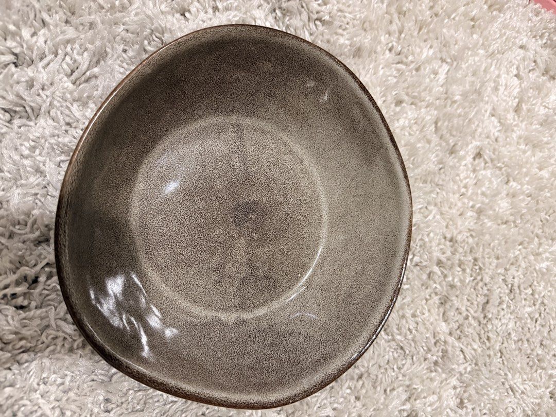 Stoneware ceramic serving bowl brown speckled glaze (Category: Dinnerware & Cutlery) located in Mandaluyong City. Submitted by riz_040521 (Listing ID 1469797881, Image 2). Description: - Speckled brown glaze with a handmade, irregular rim - Deep basin perfect for soups, salads, and side dishes - Heavy and sturdy ceramic build - Unglazed white ring on the bottom - Excellent, clean condition and ready for use -4 pieces for 480.