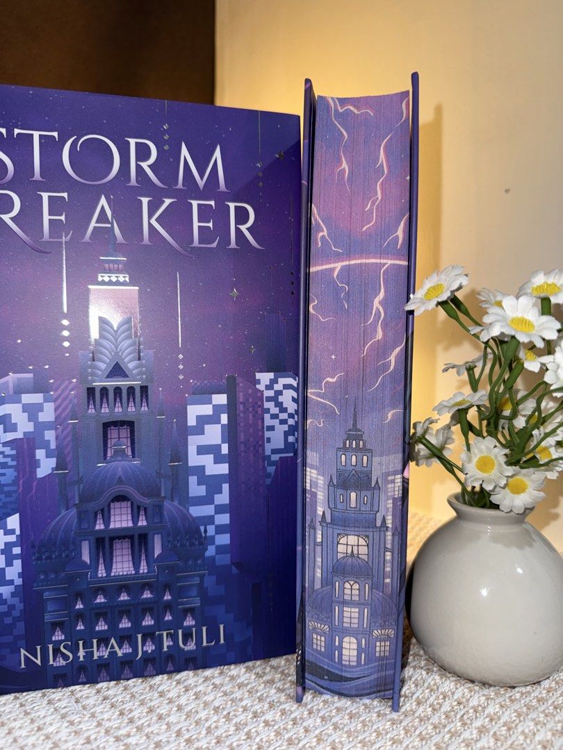 Storm Breaker | Fairyloot Edition (Category: Storybooks) located in Siaton. Submitted by bookish_zyn (Listing ID 1469442368, Image 2). Description: Brand new, sealed Fairyloot Edition of Storm Breaker by Nisha J. Tuli. Hardcover with stunning purple city cover art and matching purple sprayed edges with lightning design..