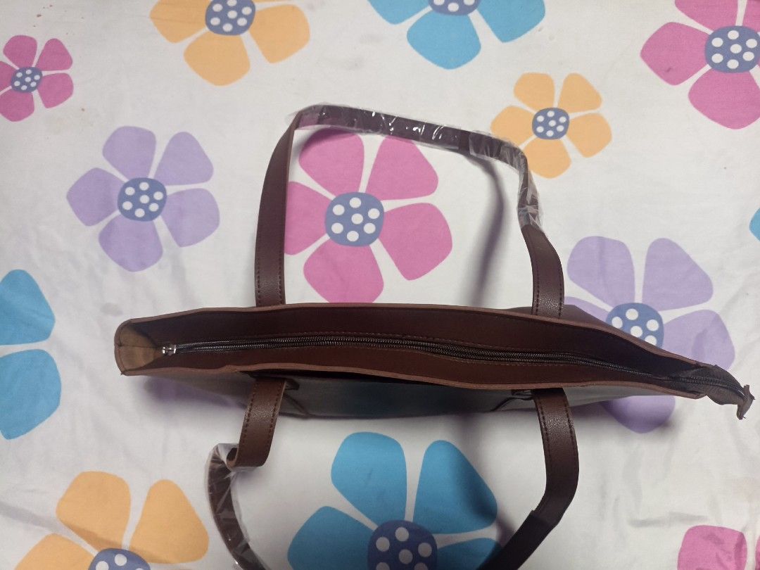 StraigthForward (Category: Tote Bags) located in Manila. Submitted by everygrind (Listing ID 1469818593, Image 2). Description: Brown Vegan leather never been use. no damages.