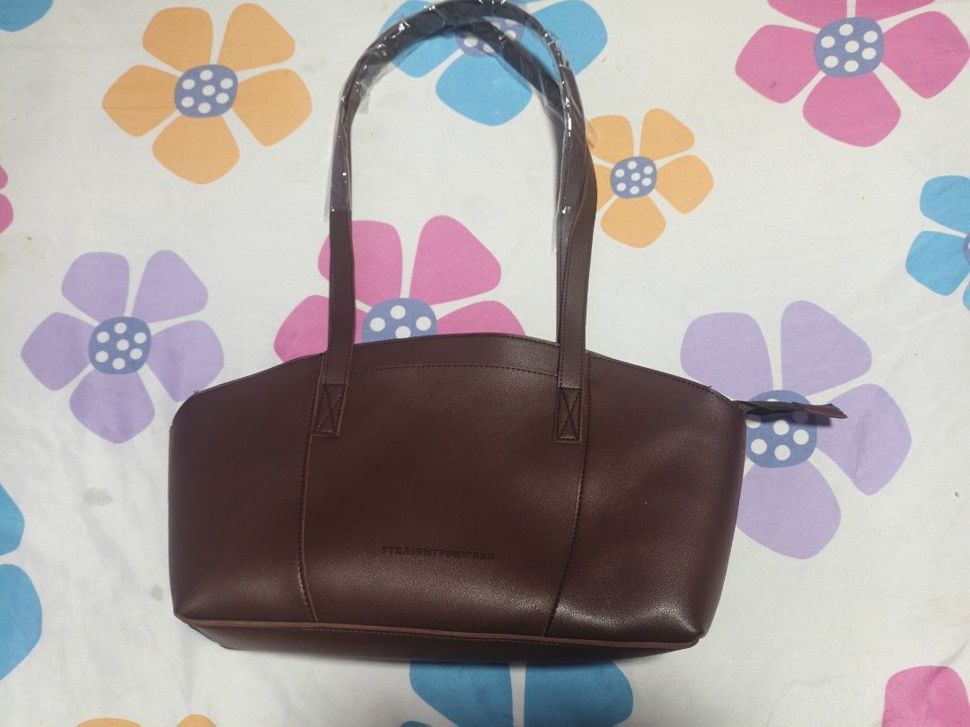 StraigthForward (Category: Tote Bags) located in Manila. Submitted by everygrind (Listing ID 1469818593, Image 1). Description: Brown Vegan leather never been use. no damages.
