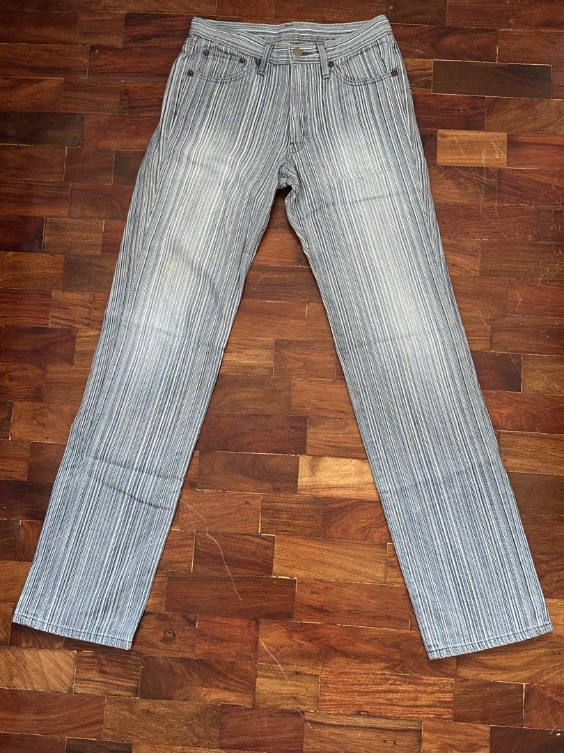Striped Jeans Size S (28) (Category: Jeans) located in Cainta. Submitted by buy.preloved (Listing ID 1469790632, Image 1). Description: - Size: S (Tag 28) - Color/Pattern: Faded blue and white vertical stripes - Fit: Slim fit through the legs - Details: Classic five-pocket design, button fly, vintage distressed wash - Model/Lot: M824, lot 150318 M - Style: Great streetwear piece.
