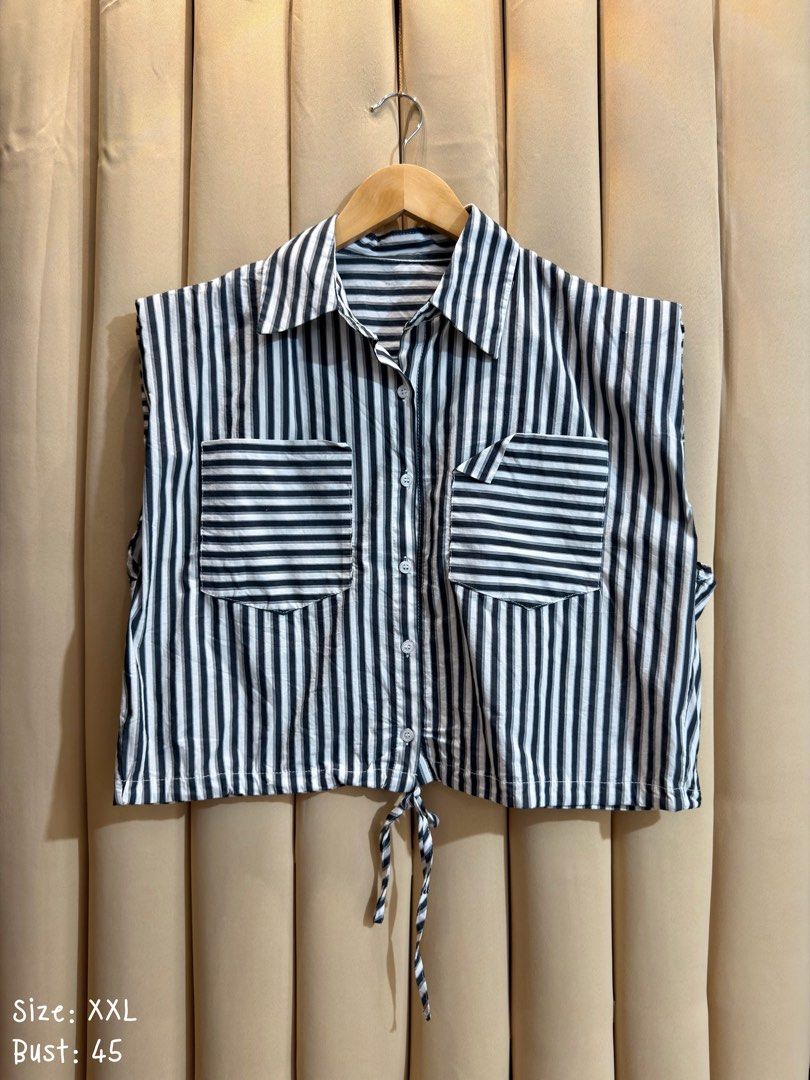 STRIPED SLEEVELESS COLLARED CROP SHIRT (Category: Blouses) located in Manila. Submitted by glamstylemnl (Listing ID 1469917576, Image 1). Description: ♡ SIZE: XXL ♡ BUST: 45 ♡ Swipe left to see the actual color & details ♡ dual chest pockets, button-down front, cinched drawstring hem ♡ HQ • 9/10 ♡ Ready to wear 👚.