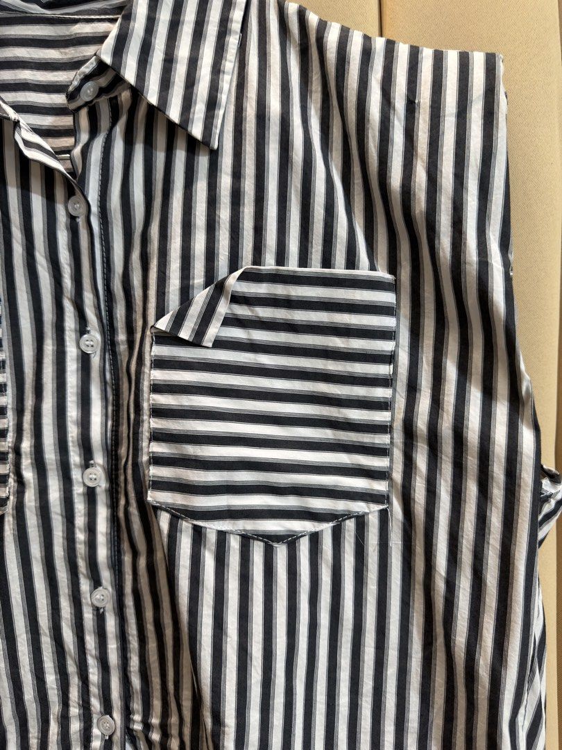 STRIPED SLEEVELESS COLLARED CROP SHIRT (Category: Blouses) located in Manila. Submitted by glamstylemnl (Listing ID 1469917576, Image 2). Description: ♡ SIZE: XXL ♡ BUST: 45 ♡ Swipe left to see the actual color & details ♡ dual chest pockets, button-down front, cinched drawstring hem ♡ HQ • 9/10 ♡ Ready to wear 👚.