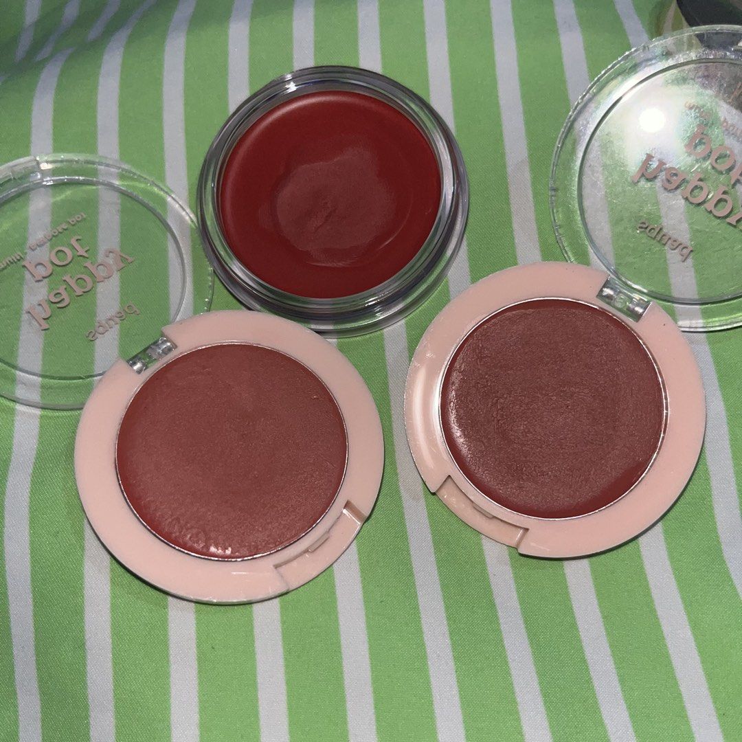Strokes Crush Blush & Squad Cosmetics Happy Pot Blush (Bundle) (Category: Makeup) located in Quezon City. Submitted by ayzria (Listing ID 1469859040, Image 3). Description: • Strokes Crush Blush in the shade Hottie • Squad Cosmetics Happy Pot Cream Blush in the shade Cheerleader & Ivy League Both were only swatched multiple times using clean hands. Never used with a brush or any other tools. Still in good condition! RFS: It doesn’t match my shade