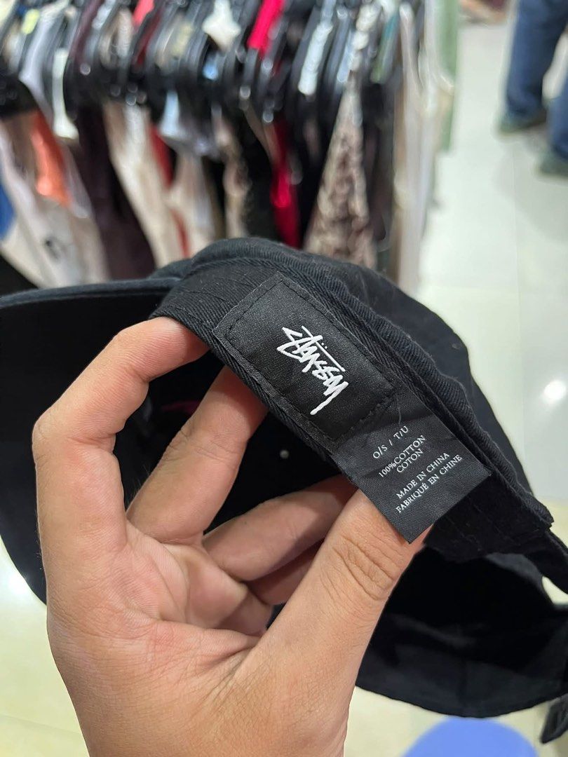 Stussy Black Cap with Pink Logo (Category: Caps & Hats) located in Manila. Submitted by jedgarments0 (Listing ID 1469786530, Image 3). Description: - Authentic Stussy black baseball cap - Eye-catching bright pink embroidered logo on the front - 100% comfortable cotton construction - Adjustable back strap for a custom fit - Structured panels and clean curved brim - Interior tags and holographic authenticity sticker intact - Condition: Excellent, c