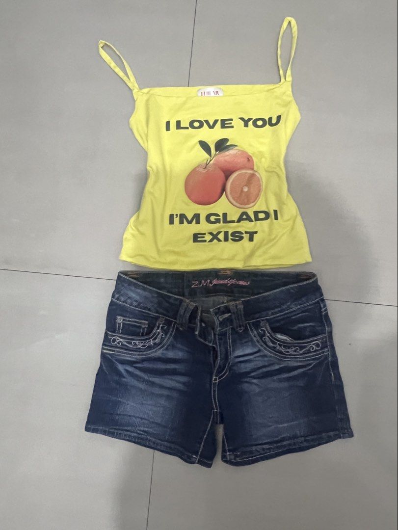 summer set: graphic tank top, denim shorts (Category: Sets or Coordinates) located in Caloocan City. Submitted by guaconerva97479 (Listing ID 1469933677, Image 1). Description: TAKE ALL: 270 Yellow Orange Graphic Tank Top: 200 Denim Shorts: 100.