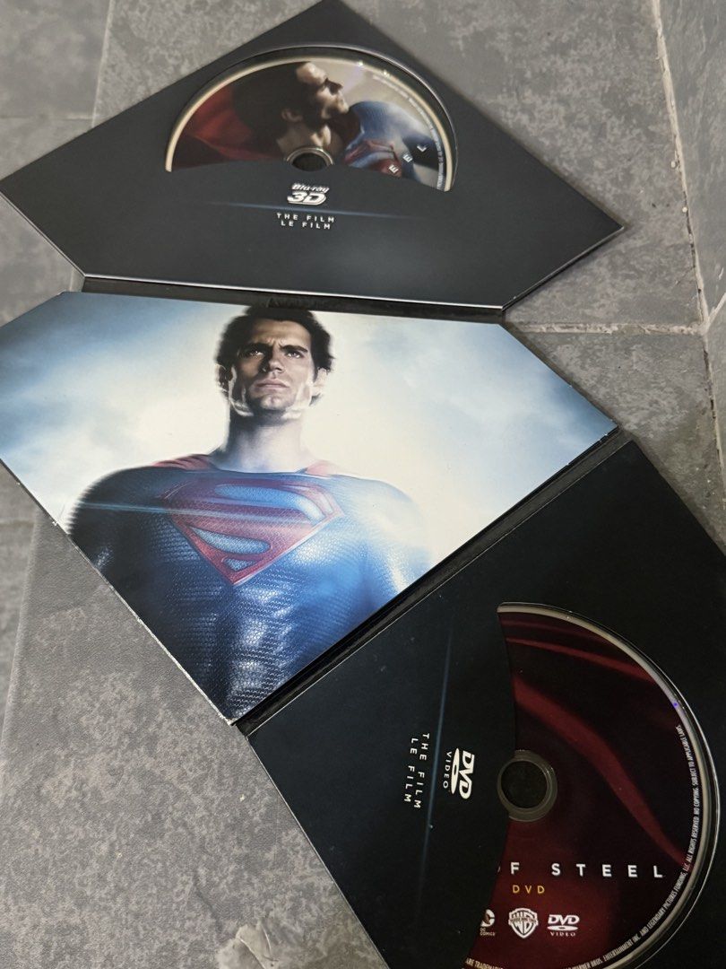 SUPERMAN Limited Edition Diamond Pack Blu-ray 3D (Category: CDs & DVDs) located in Binan City. Submitted by emwieee (Listing ID 1469917500, Image 3). Description: - Superman Crest Shaped Case: Unique, highly collectible packaging designed for true DC fans. - Multi-Disc Set: Includes 3D Blu-ray, regular Blu-ray, DVD, and exclusive special features. - Star-Studded Artwork: Features iconic imagery of Henry Cavill and Michael Shannon. - Shipping & Me
