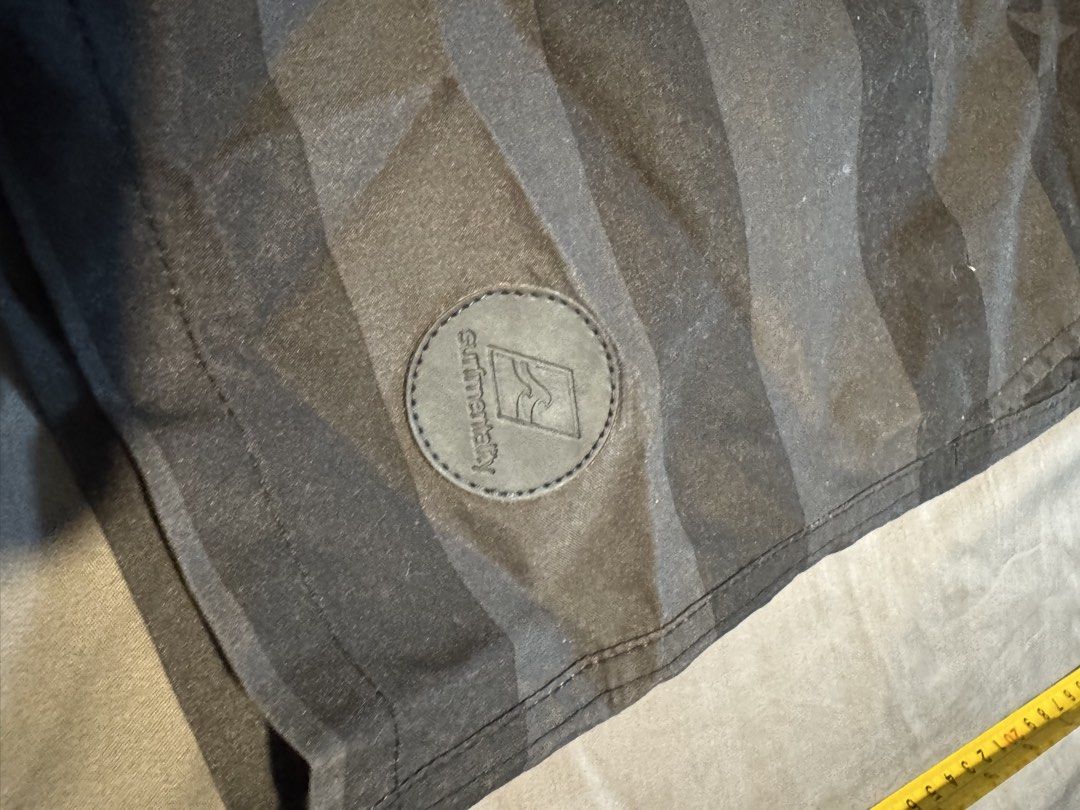 Surfmentality Black/ Grey Swim Trunks Size L (Category: Swim Trunks & Board Shorts) located in Taguig. Submitted by dependingonvibe (Listing ID 1469784443, Image 3). Description: - Brand: Surfmentality - Color: Black with subtle USA flag-inspired stripe and star pattern - Size: Large (Waist: ~17 inches, Length: ~16.5 inches) - Details: Elastic waistband, white adjustable drawstring, comfortable white mesh lining - Extra: Stylish round branded pat