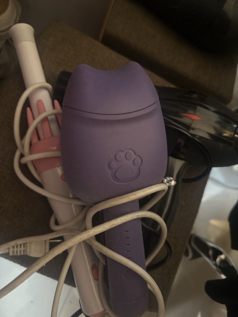 take all—blower, mermaid curl, blower (Category: Hair) located in Manila. Submitted by declutterthisandthat (Listing ID 1469783478, Image 1). Description: - Color: Solid purple plastic - Design: Cute cat paw imprint on the handle with cat ear-shaped top - Function: Ideal for quick and easy pet grooming and cleanup sessions - Condition: Brand new and ready to ship - Mode of Payment: GCash or BPI accepted - Shipping: Fast shipping via J&T Express.